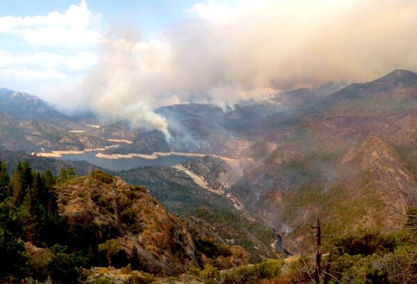 Smoke from the Aspen Fire rises over Mammoth Pool Reservoir. | Photo: Courtesy John Smith/Inciweb