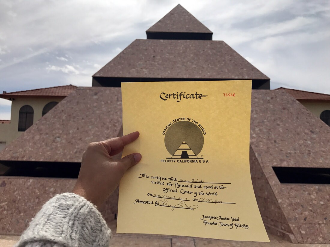 Certificate visitors receive for standing in the pyramid at the Center of the World in Felicity | Jean Trinh