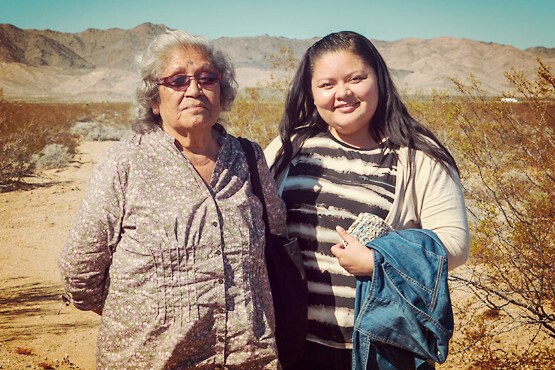 Drusilla Burns (Mojave elder) and her Grandaughter Ashley Hemmers at the 17th Ward Valley reunion in 2015. | Photo: Kim Stringfellow.