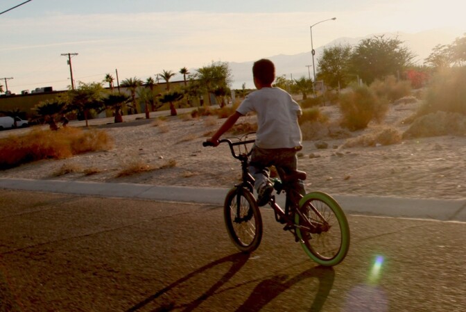 A bicyclist riding to the next art site | Photo: Drew Tewksbury