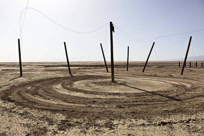 "Dirt Circle with Poles No. 1." Salton Sea, CA. 2014. | Photo: Osceola Refetoff.