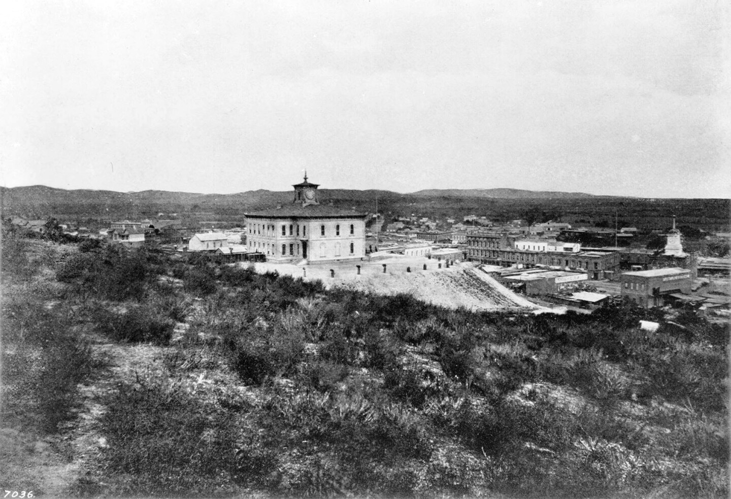 The schoolhouse was a prominent landmark from 1872 to 1886, its clocktower visible from nearly every corner of the city. Courtesy of the USC Libraries - California Historical Society Collection.
