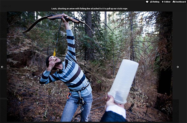 A friend of Trev Lee uses an arrow to secure rope for climbing a Giant Sequoia in Yosemite National Park.