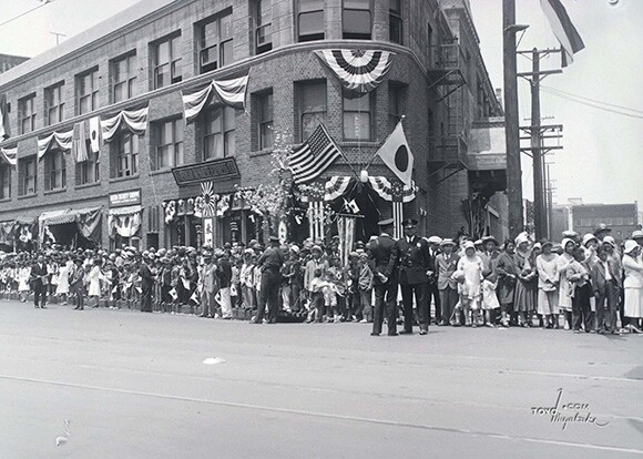 "Street Parade of Little Tokyo, 1932 Olympics" by Toyo Miyatake, 1932, Courtesy of Alan Miyatake of Toyo Miyatake Studio.