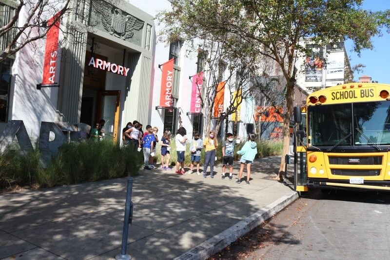The Armory kids outside the museum leaving the bus