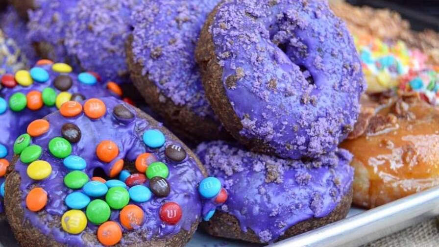 The original ube donut and other flavors | Courtesy of DK's Donuts