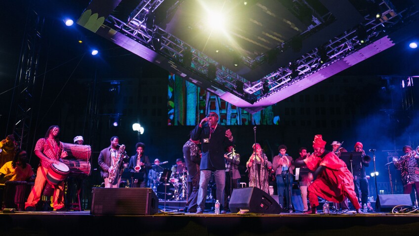 Pan Afrikan Peoples Arkestra on stage at Grand Park during a New Year's Eve celebration | Samantha Lee sls ep9 preview