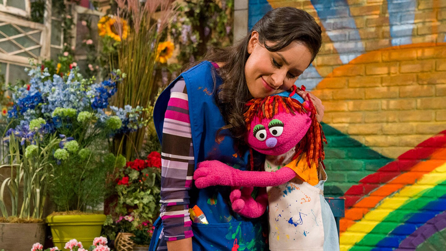 Lily with Sofia, played by Jasmine Romero. | Courtesy of Sesame Workshop and Richard Termine
