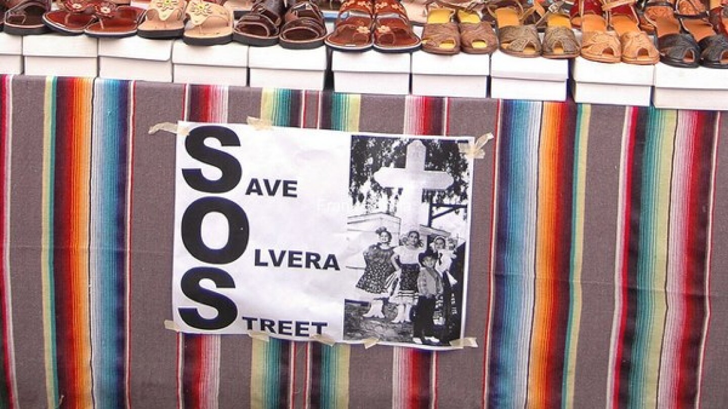 A 'Save Olvera Street' sign seen in 2010 as merchants and the city negotiated rent prices