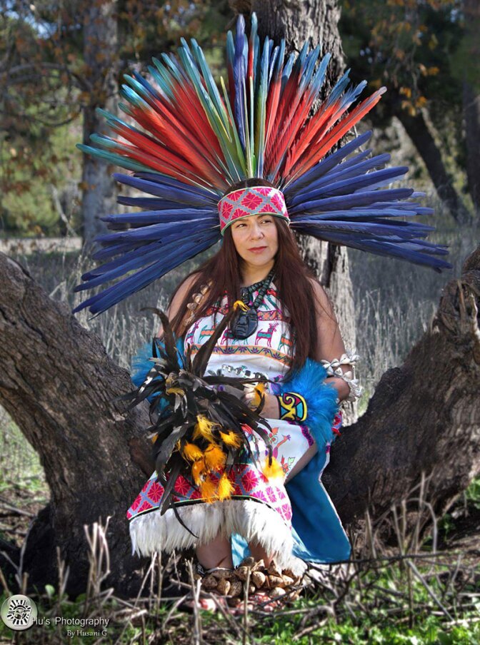 Gypsie Vasquez-Ayala poses in her danza regalia. | Hu’s Photography by Husani G, Courtesy of Gypsie Vasquez-Ayala