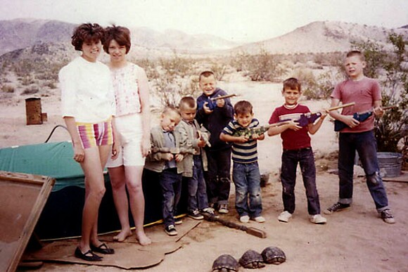 A 1950s homesteading family with three of their "pet" tortoises in Twentynine Palms. | Photo: Courtesy Joanne Anderson.