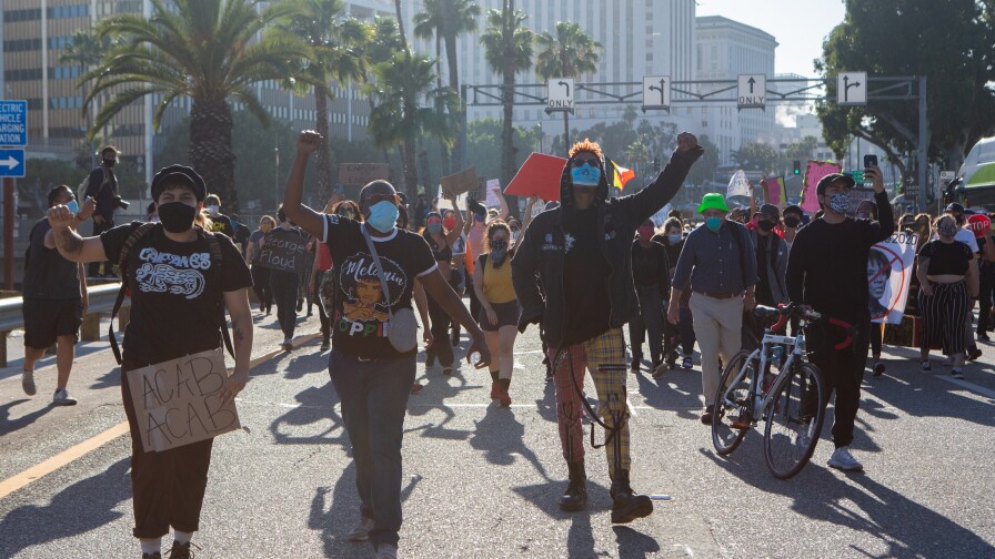 Protesters overtake the 101 freeway near downtown Los Angeles on Wednesday, May 27, 2020.