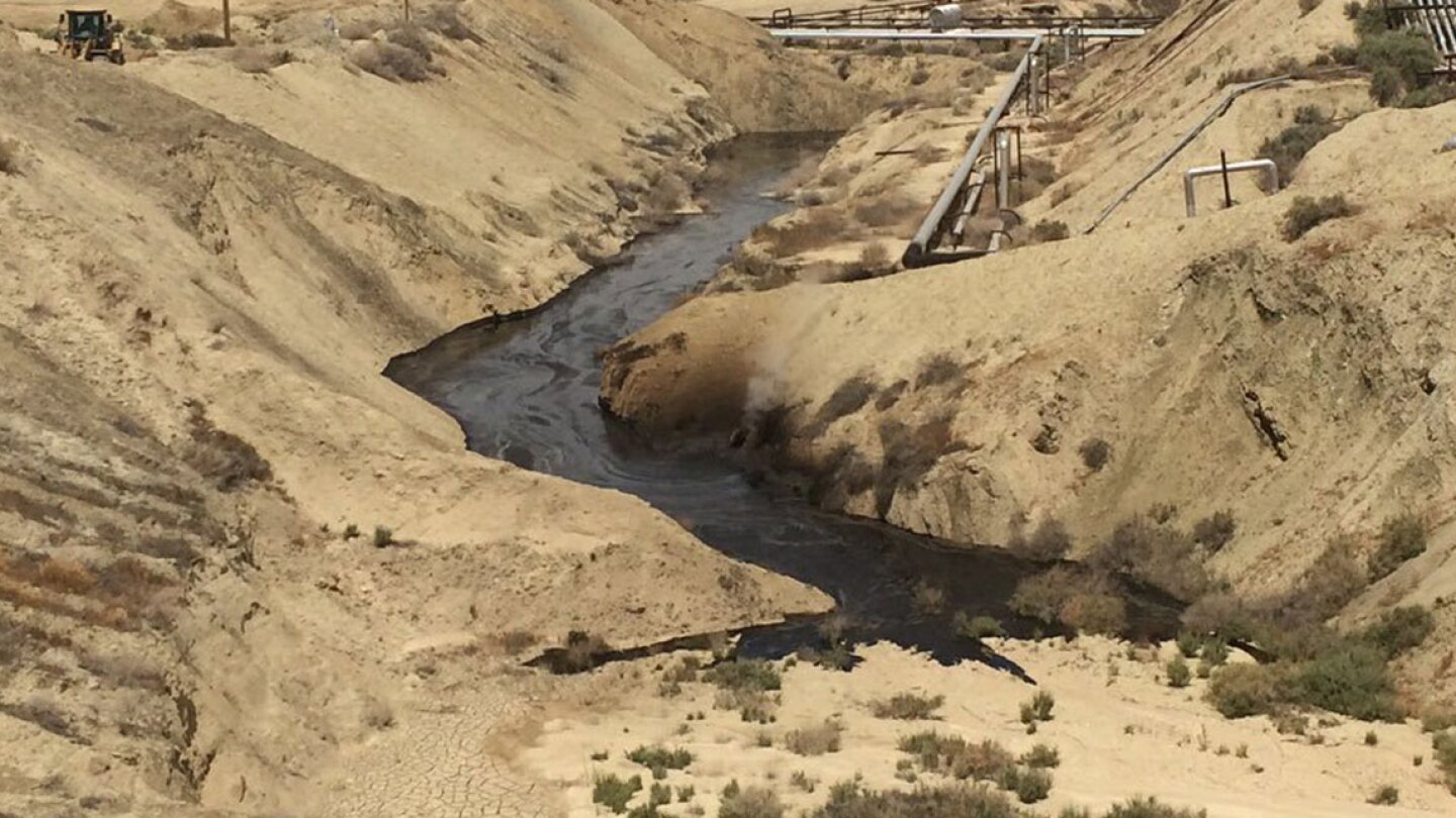 Photograph of "crude oil surface expression" at Cymric Oil Field. | Still by the California Department of Fish and Wildlife's Office of Spill Prevention and Response