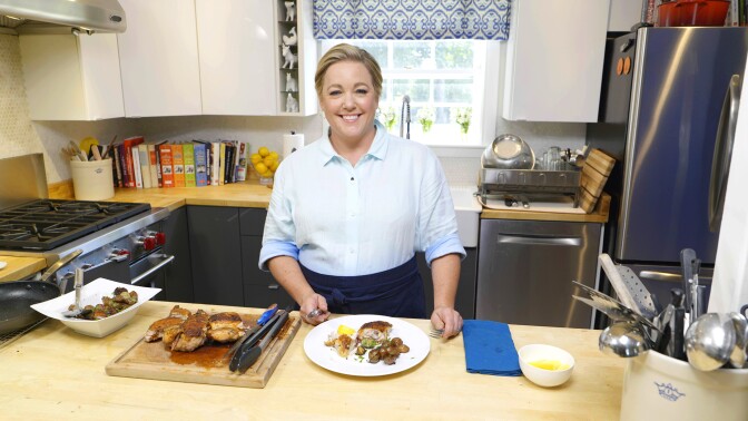 Image of Julia cooking from her home-kitchen taken from episode 2103.