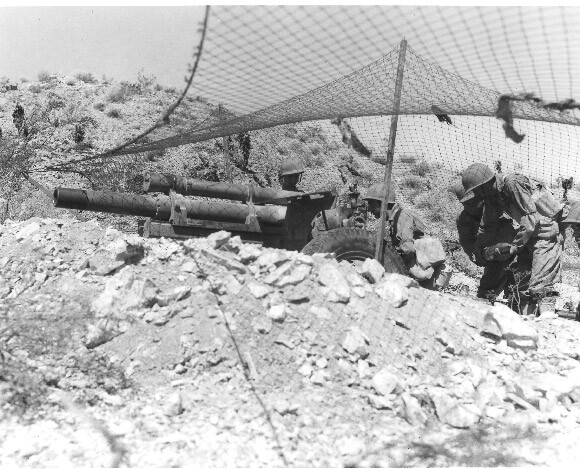 Soldiers practice with field artillery near Needles, California in September 1942. U.S. Army photograph | Courtesy of the General Patton Memorial Museum.