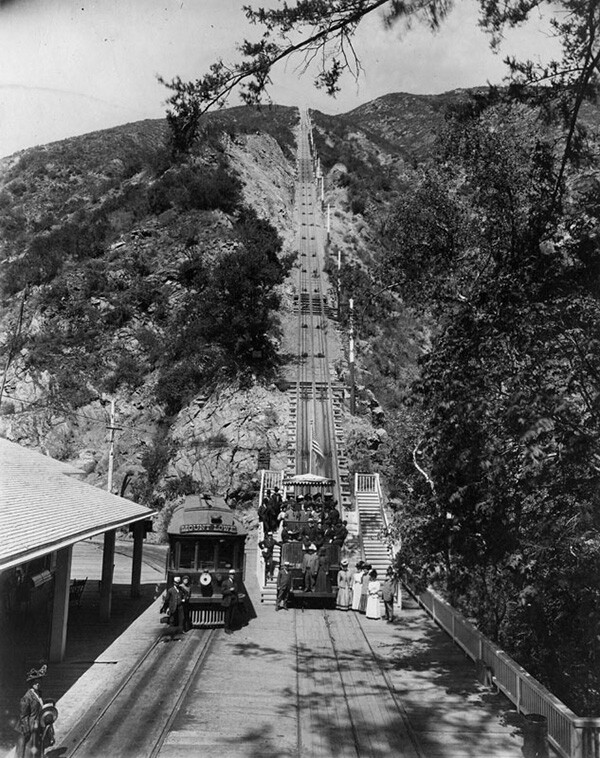 View of Mount Lowe's cable incline at the Rubio Pavilion. A group poses in the car at the bottom of the incline. | Courtesy of the Los Angeles Public Library