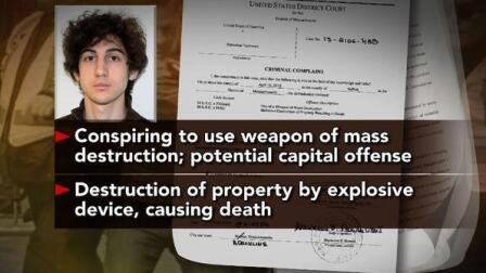 Bombing Suspect Arraigned on Charges While Hospitalized