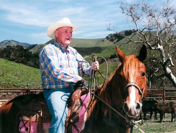 Madonna Inn co-founder Alex Madonna and his horse Pebbles. | Photo: Courtesy of Madonna Inn.