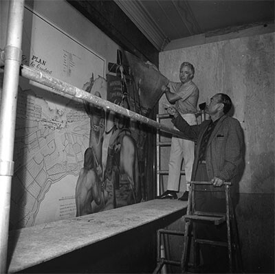Artist Edward Biberman watching a worker remove his mural from the Los Angeles Federal Building, 1965 | Los Angeles Times Photographic Archive at UCLA Library