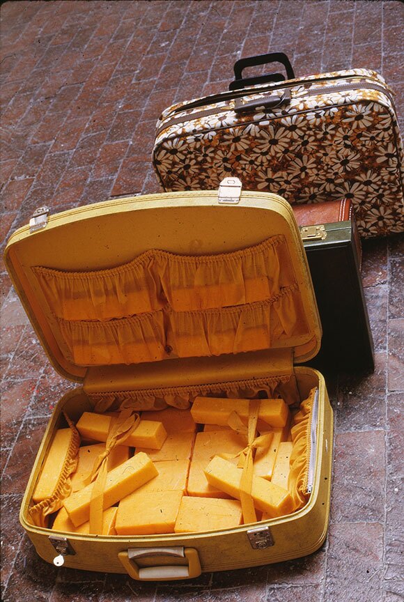 Dieter Roth, "Staple Cheese, A Race," 1970, Cheese stuffed into 37 suitcases. | Image courtesy of the Eugenia P Butler Estate.