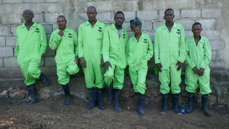 SOIL employees outside the treatment plant. Port-au-Prince, Haiti, from "Human: The World Within"