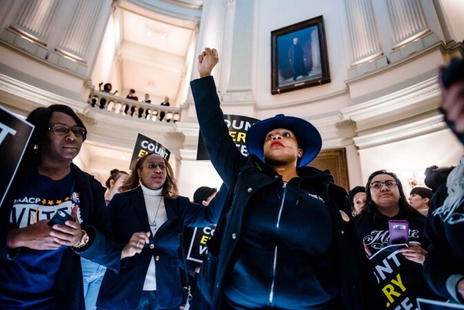 Mary Hooks of Southerners on New Ground leads the Count Every Vote protest at the Georgia State Capitol in Atlanta, Georgia, in 2018. | Kevin Lowery