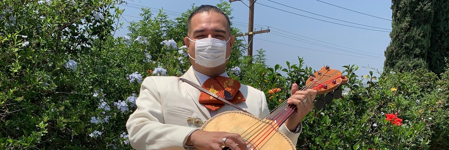 Joel Jacques of Mariachi Los Criollos de Guadalajara holds his guitarrón before a Los Angeles gig. | Courtesy of Joel Jacques
