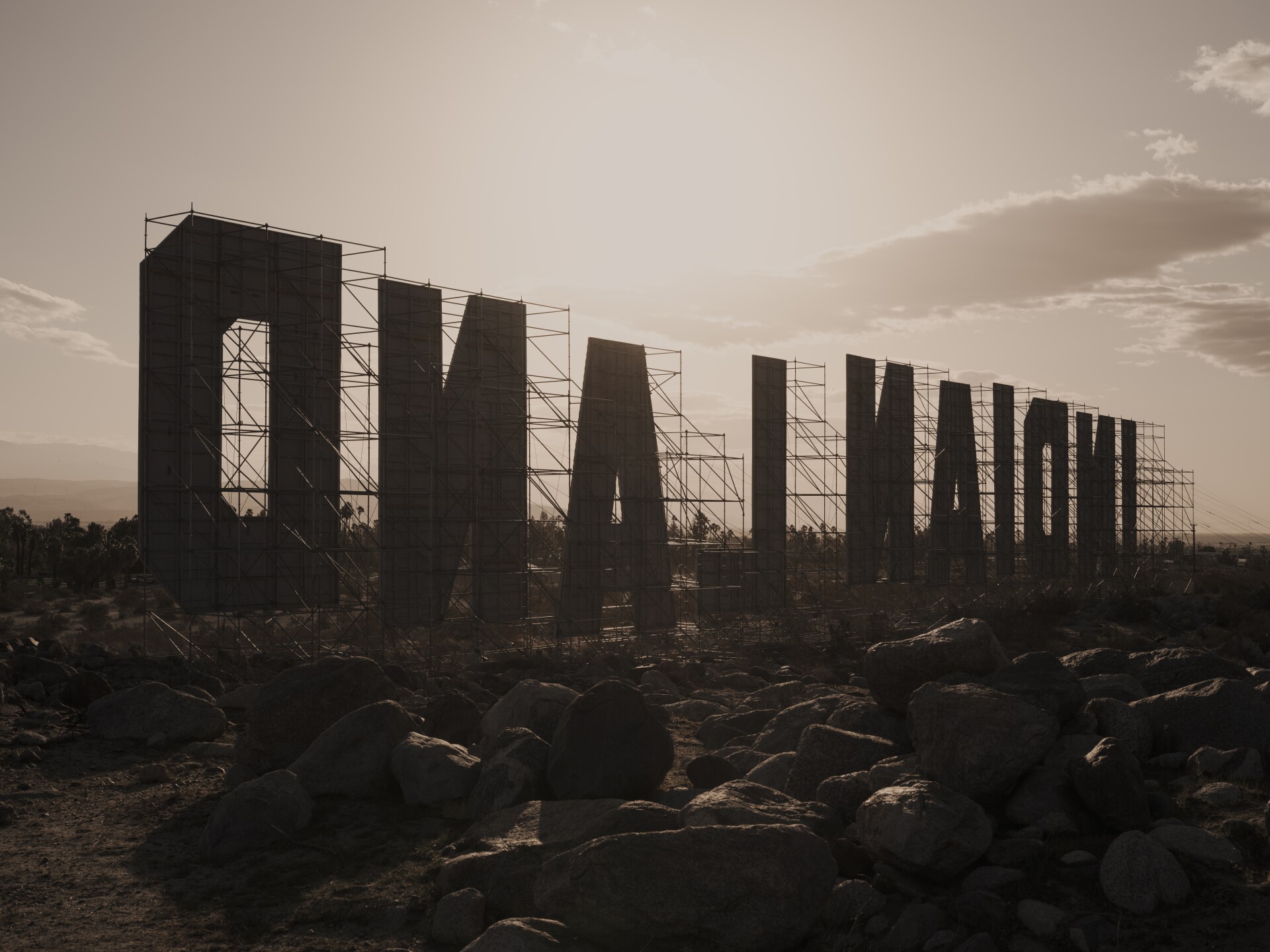 Nicholas Galanin's "Never Forget" installation consists of the words "Indian" and "Land" writ large like the Hollywood sign.