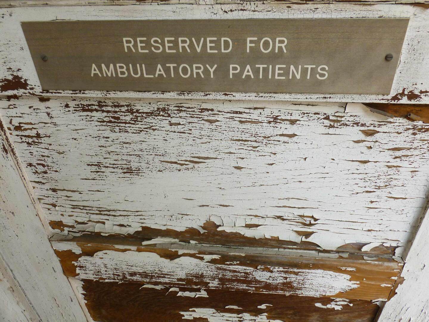 A sign at a cottage across the Barlow Respiratory Hospital reads "Reserved for ambulatory patients." | Sandi Hemmerlein
