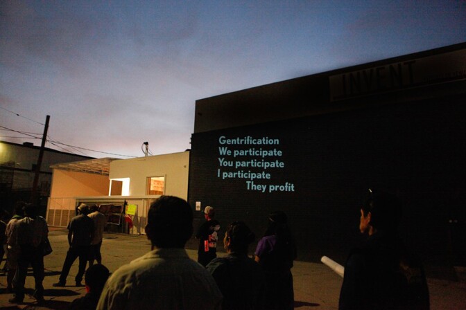 Projection of Gentrification Poem on PSSST Wall. | Photo: La Union de Vecinos