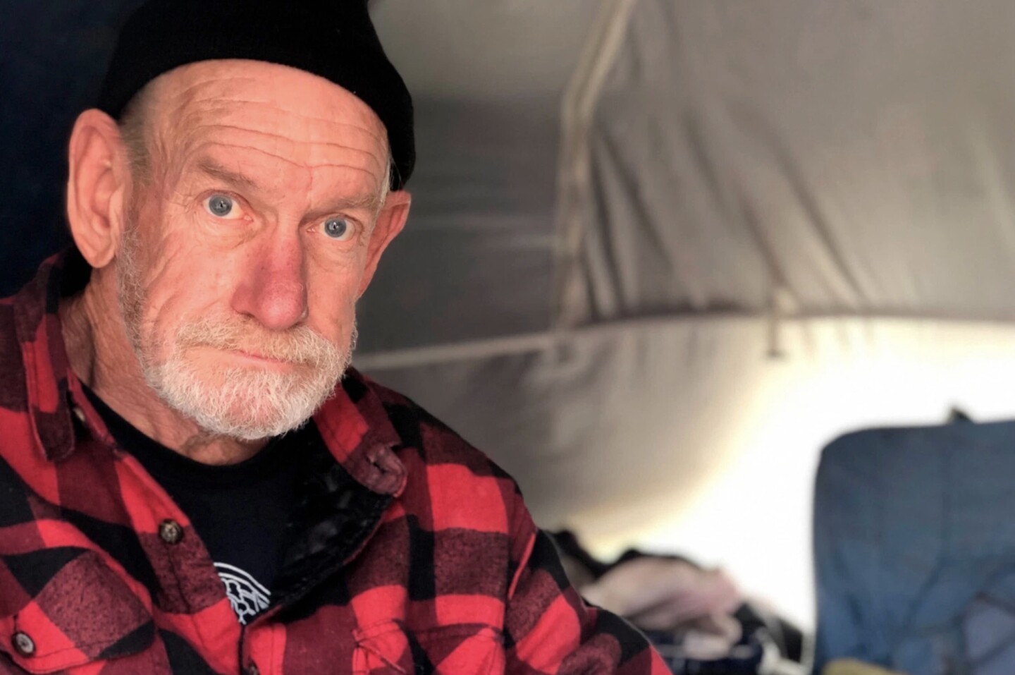 Kent Dull lives at the Here There encampment in Berkeley, California. | Cal Matters
