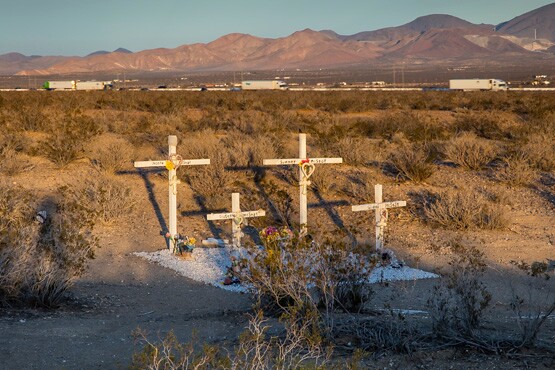 The McStay family memorial site located northwest of Victorville, CA. Traffic on the I-15 can be seen in the distance. | Photo: Kim Stringfellow.