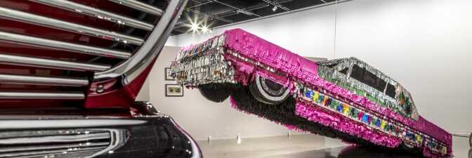 Justin Favela’s “Gypsy Rose Piñata" at “The High Art of Riding Low: Ranflas, Corazon E Inspiracion,” an exhibition at Petersen Automotive Museum | Photo courtesy Petersen Automotive Museum