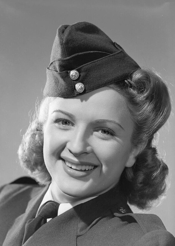 A woman in a military uniform.