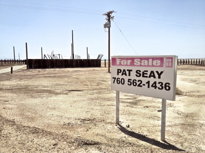 "Desert Ruin with For Sale Sign." Salton Sea, CA. 2014. | Photo: Osceola Refetoff.
