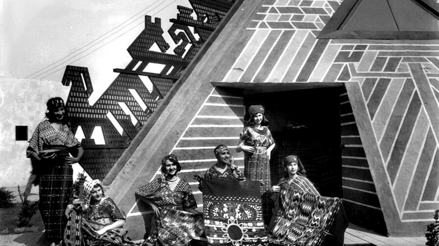 Guatemala Building. Strikingly colored and edged with stylized designs, the Guatemala building highlighted native textiles. Photograph courtesy of Security Pacific National Bank Collection, Los Angeles Public Library