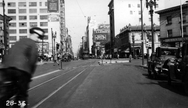 Broadway Place created a complicated, five-way intersection. The raised concrete platform allowed pedestrians to wait safely for a streetcar. Courtesy of the Automobile Club of Southern California.