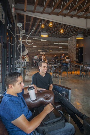 Caleb Sorola, left, and Joe DiGerolamo enjoying their coffee. | Photo: Douglas McCulloh