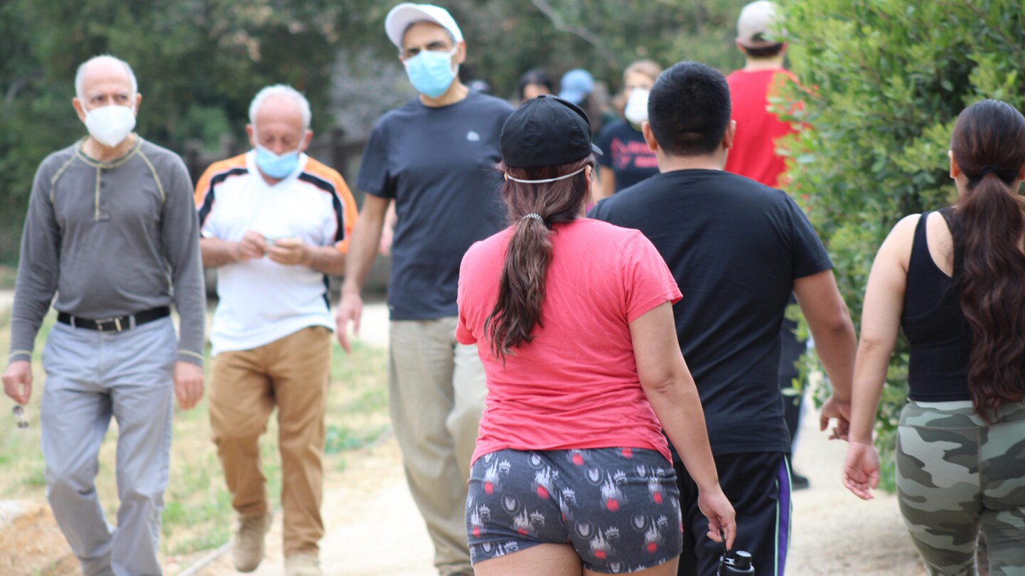 People walk in Temescal Canyon, May 9. 2020, the first day L.A. City and County trails are reopened. | Karen Foshay