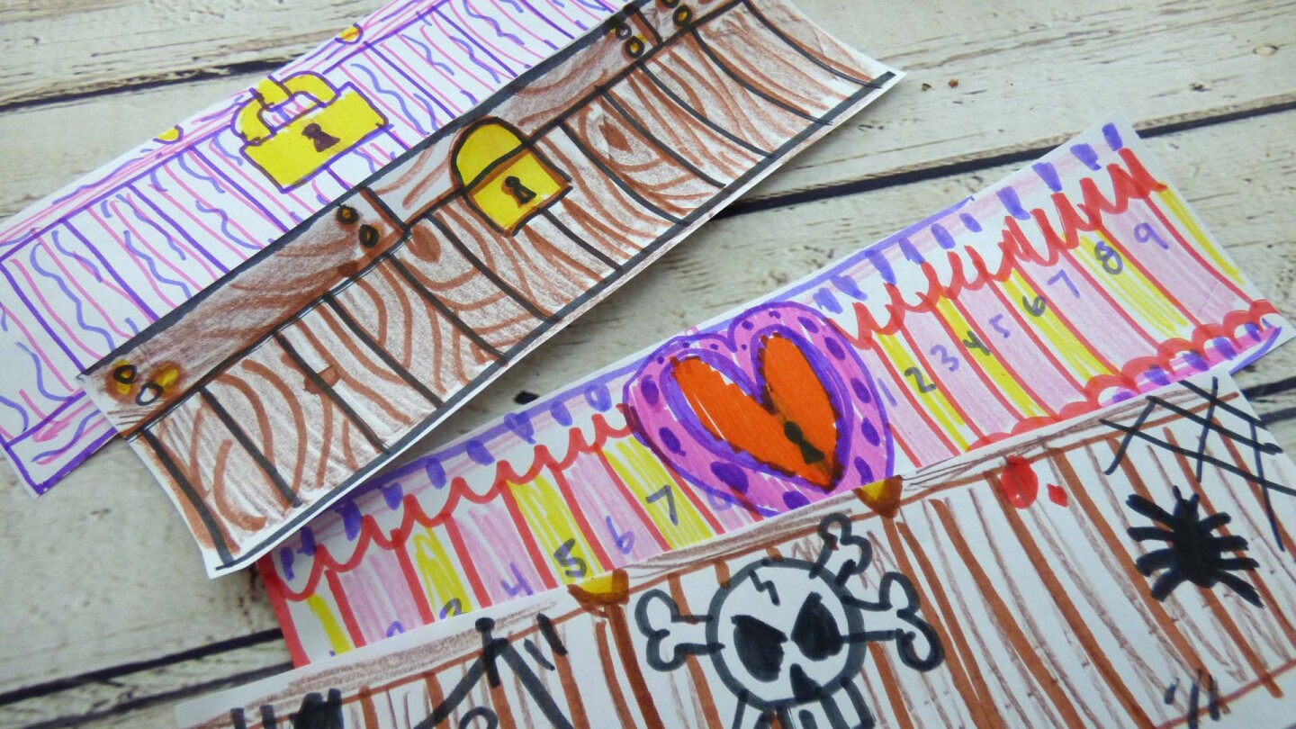 "Wooden boards" with different pirate-inspired designs.
