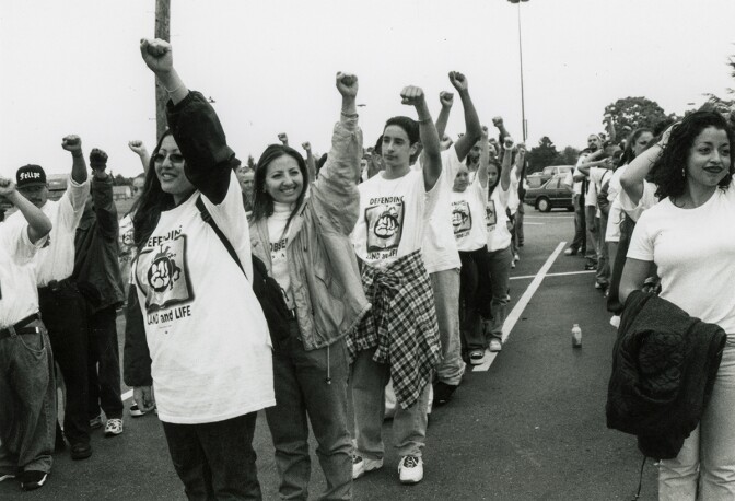 Students line up in a Panther-like formation after successful walk outs of thousands of Bay Area youth defending land and life, demanding justice and resisting various propositions including Prop 187 and 209. | Kahlil Jacobs-Fantauzzi
