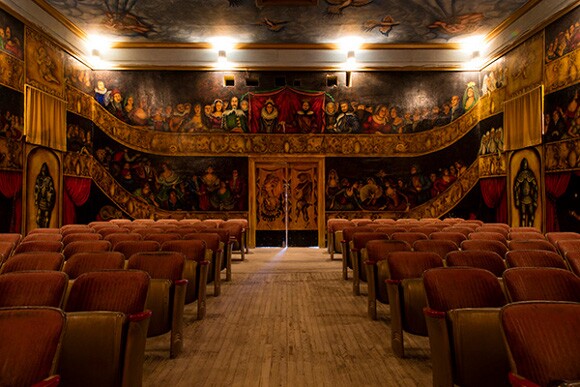 The interior of the Amargosa Opera House painted by Marta Becket during 1968-1974. | Photo: Kim Stringfellow.