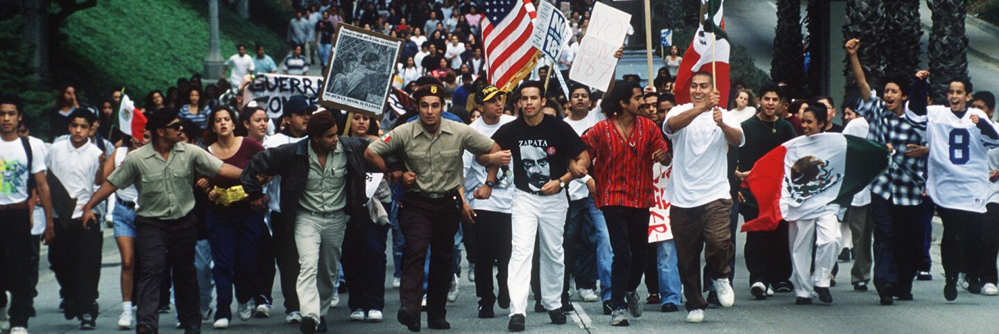 Hundreds of Fullerton College students march through Fullerton, California protesting Proposition 187 on November 2, 1994. | Bruce Chambers / MediaNews Group / Orange County Register via Getty Images