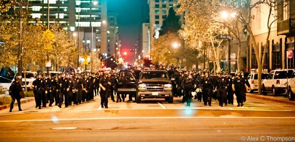 LAPD officers approach city hall to evict Occupy L.A. protesters | Photo by Alex Thompson