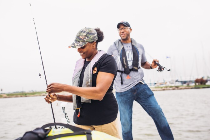 Captain Fred fishes alongside Chef Chris Williams and Dawn Burrell for Black Drum fish.