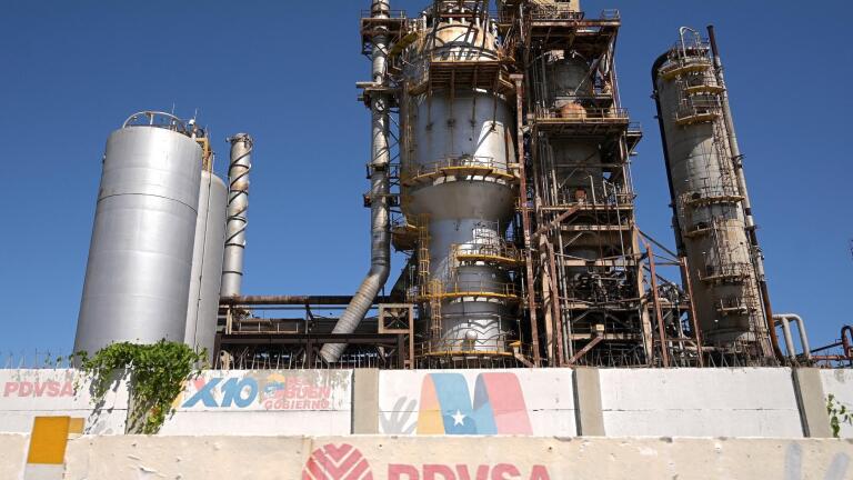 News Wrap: U.S. eases sanctions on Venezuelan oil