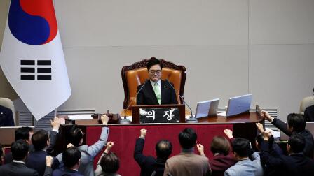 News Wrap: South Korea parliament impeaches acting president