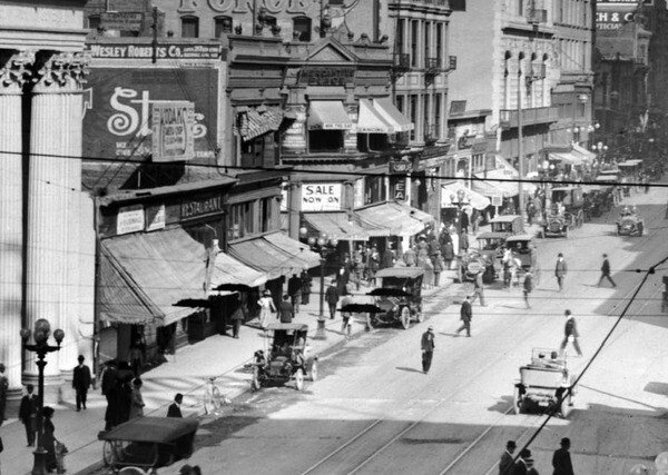 1915 view of Mercantile Place's intersection with Spring Street. Courtesy of the USC Libraries - California Historical Society Collection.
