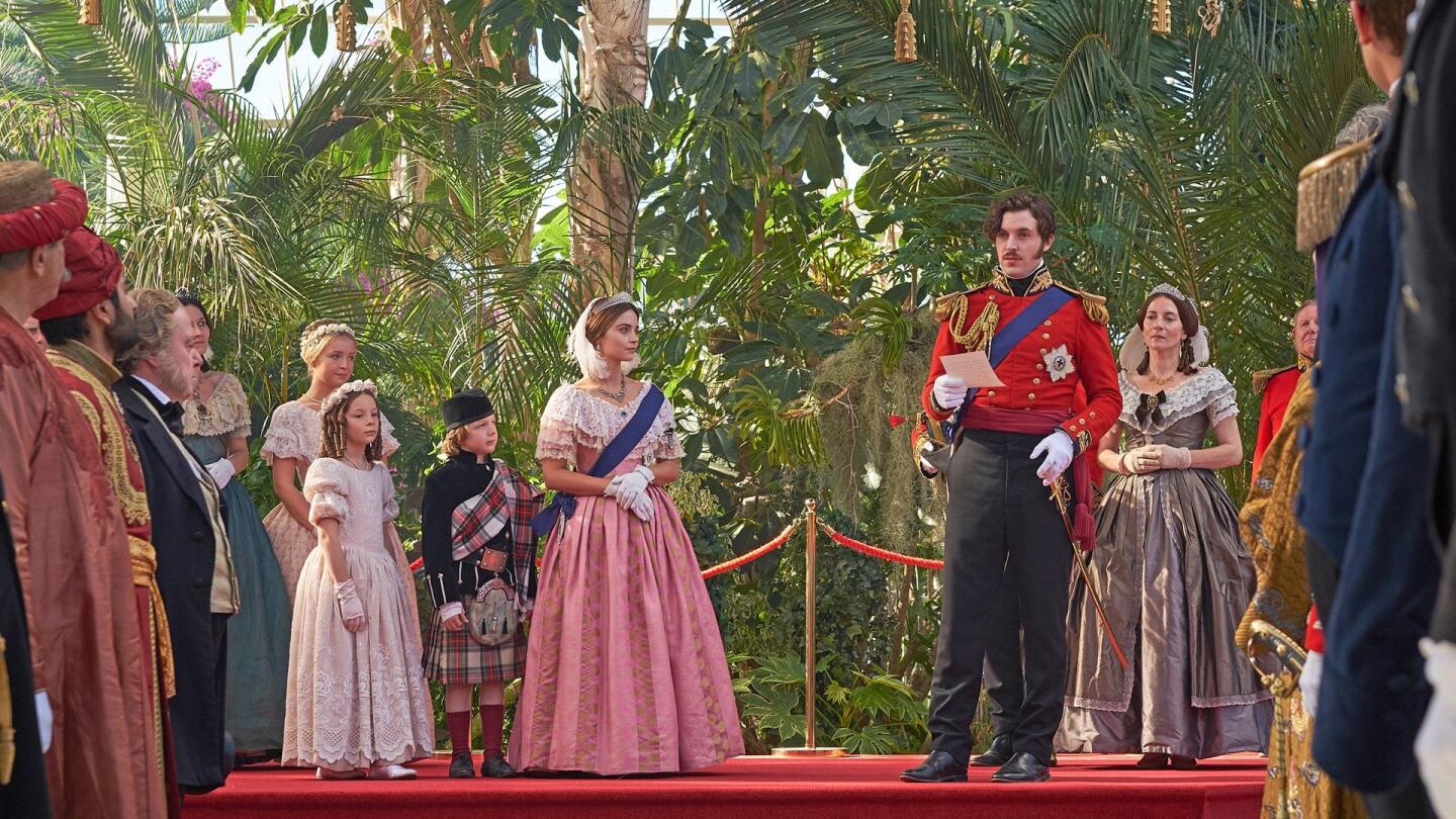 Prince Albert (Tom Hughes) addresses a crowd while Queen Victoria (Jenna Coleman) and her children watch him at his side. | "Victoria Season 3 on Masterpiece: The White Elephant"