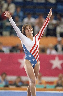 At the 1984 L.A. Ollympics, Mary Lou Retton became the first Americanwoman ever to win an individual gold medal in gymnastics. | photo by Lionel Cironneau/Associated Press